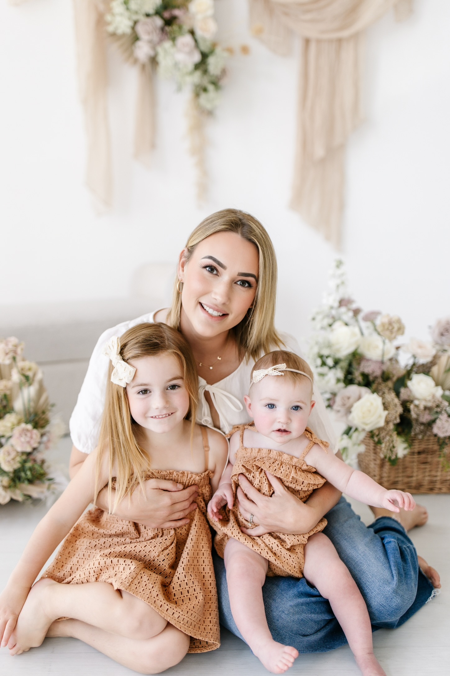 Creator with her two daughters in a cozy setting